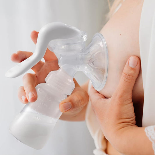 Ergonomic manual breast pump